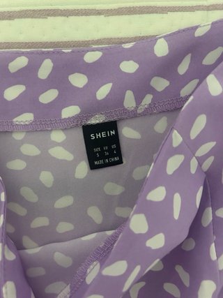 Falda larga morada con estampado blanco