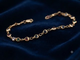 Pulsera dorada corazones cristales