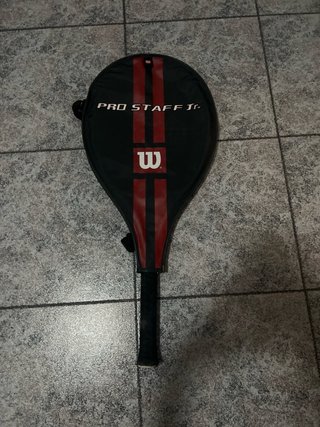 Raquetas con fundas y pelotas wilson