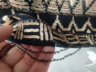 Falda corta lentejuelas doradas y negras