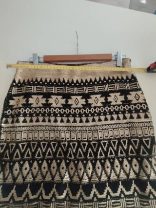 Falda corta lentejuelas doradas y negras
