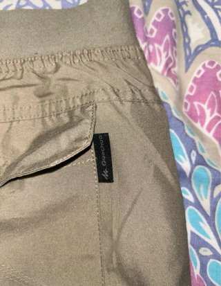 Pantalón trekking hombre Quechua verde oliva