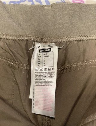 Pantalón trekking hombre Quechua verde oliva