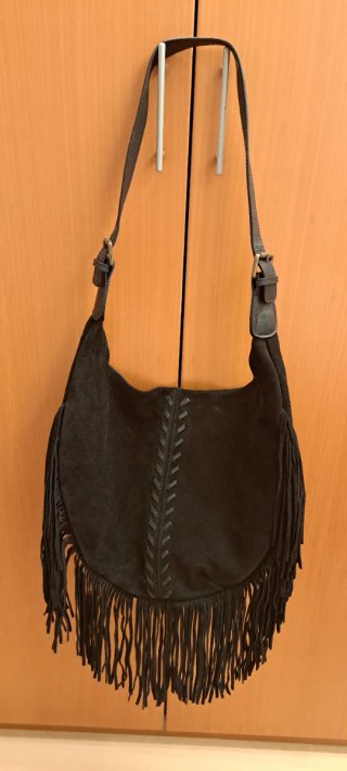 Bolso negro de piel con flecos nuevo a estrenar