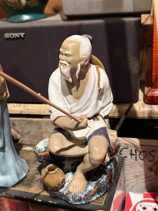 Figuras de pescadores antiguos