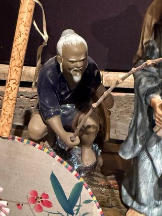 Figuras de pescadores antiguos