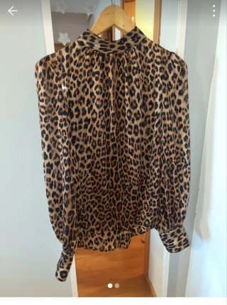 Camisa leopardo cuello alto manga larga