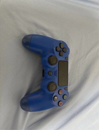 PS4 (PlayStation 4) con Mando Azul