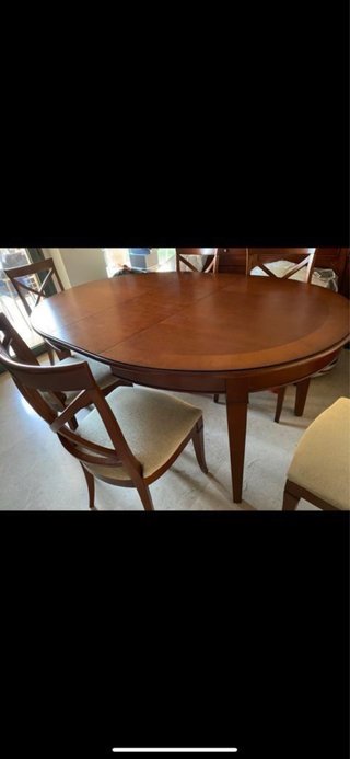 Mesa ovalada de madera y 6 sillas desplegable