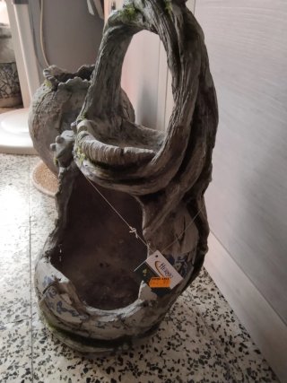 Macetero de piedra y yute