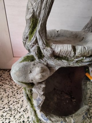 Macetero de piedra y yute