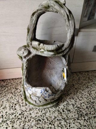 Macetero de piedra y yute
