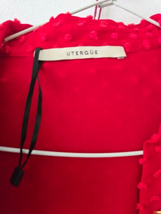 Chaqueta de cuadros con detalles rojos