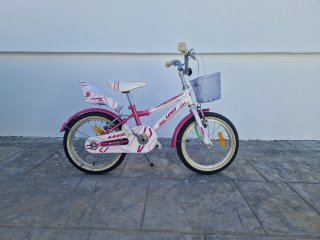 Bicicleta niña rosa y blanca poco uso