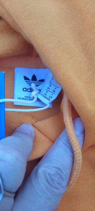 Felpa Adidas arancione con strisce