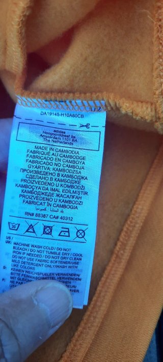 Felpa Adidas arancione con strisce