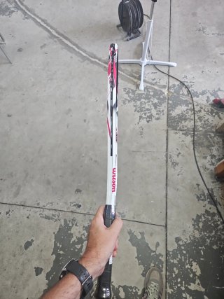 Raqueta Wilson Fusion XL Tenis doblada golpeada