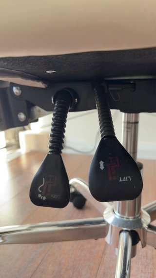 Silla ergonómica reclinable con reposapiés