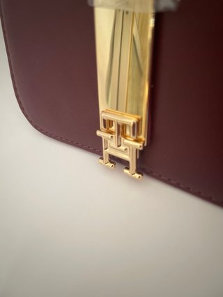 Monedero billetera burdeos con detalle dorado