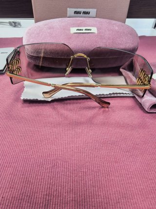 Gafas de sol Miu Miu doradas y rosas