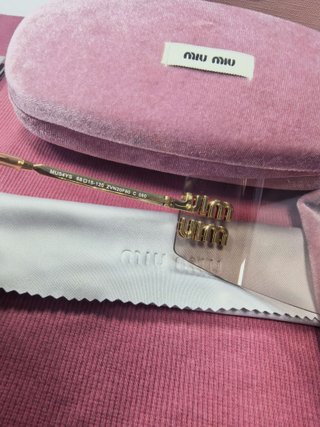 Gafas de sol Miu Miu doradas y rosas