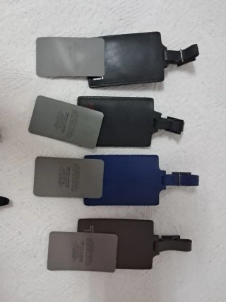 Tumi etiquetas de equipaje