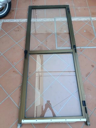 Puerta acristalada de una hoja