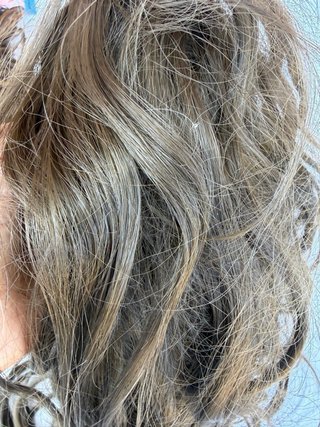 Coda di capelli veri castani lunghi mossi