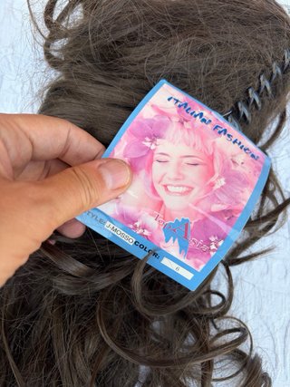 Coda di capelli veri castani lunghi mossi