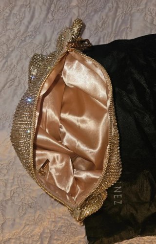Bolso de fiesta dorado con pedrería