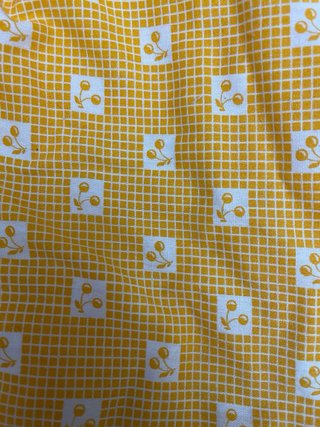 Vestido amarillo hecho a mano con smock