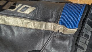 Mono Dainese Cuero Negro/Azul