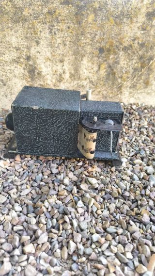 Proyector antiguo NICE con películas