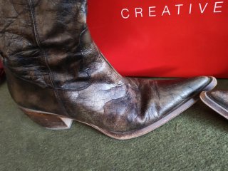 Botas altas Mara mujer negras y doradas