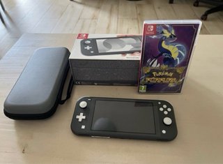 Nintendo Switch Lite Gris y Blanca como nueva