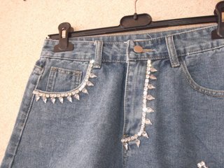Top uncinetto e shorts in denim