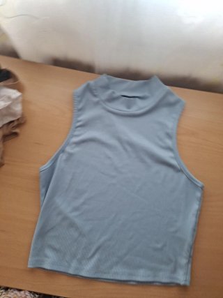 Top azul cuello alto talla M