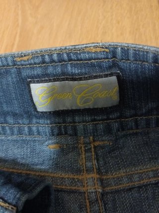 Falda vaquera con cinturón Poco uso . Talla 40 .