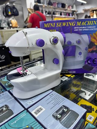 Mini Máquina de Coser Eléctrica