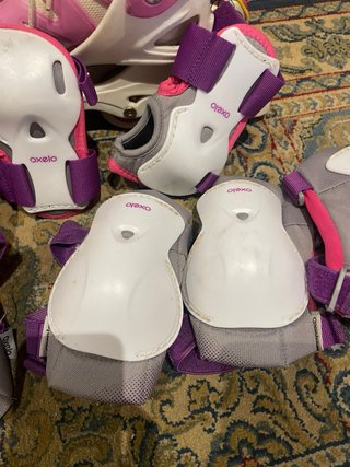Patinetes en línea Oxelo rosas y blancos