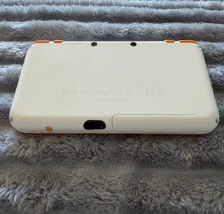 New Nintendo 2DS XL Naranja y Blanca