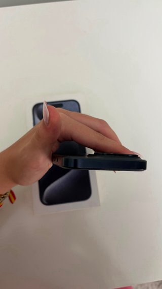 iPhone 15 Pro Azul + 6 Fundas
