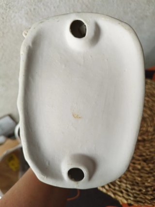 Figura de porcelana de pareja tocando flauta