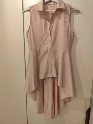 Short negro de Zara y camisa rosa sin mangas