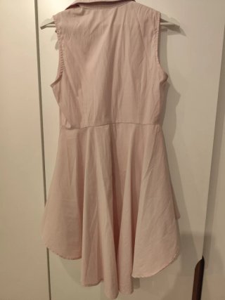 Short negro de Zara y camisa rosa sin mangas
