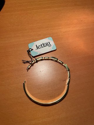 Pulseira dourada Jettag com pedras