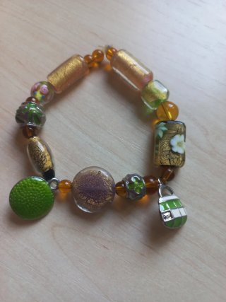 3 Pulseras elásticas doradas y naranjas  artesanas