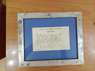 Receta médica antigua enmarcada