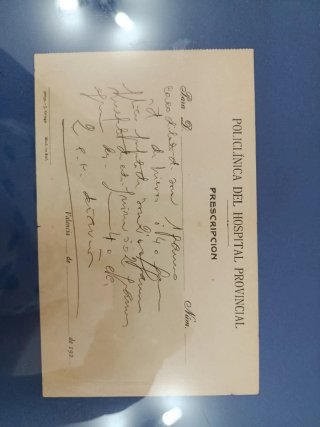 Receta médica antigua enmarcada