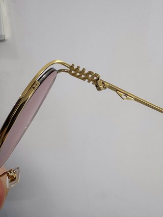 Occhiali da sole Miu Miu oro rosa